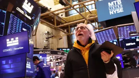 Stock markets fall after US tariffs spark trade war fears - BBC.com